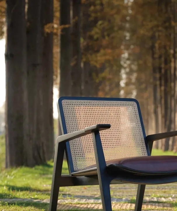 Armchair with a woven-pattern back in the INK collection by Knights Craft