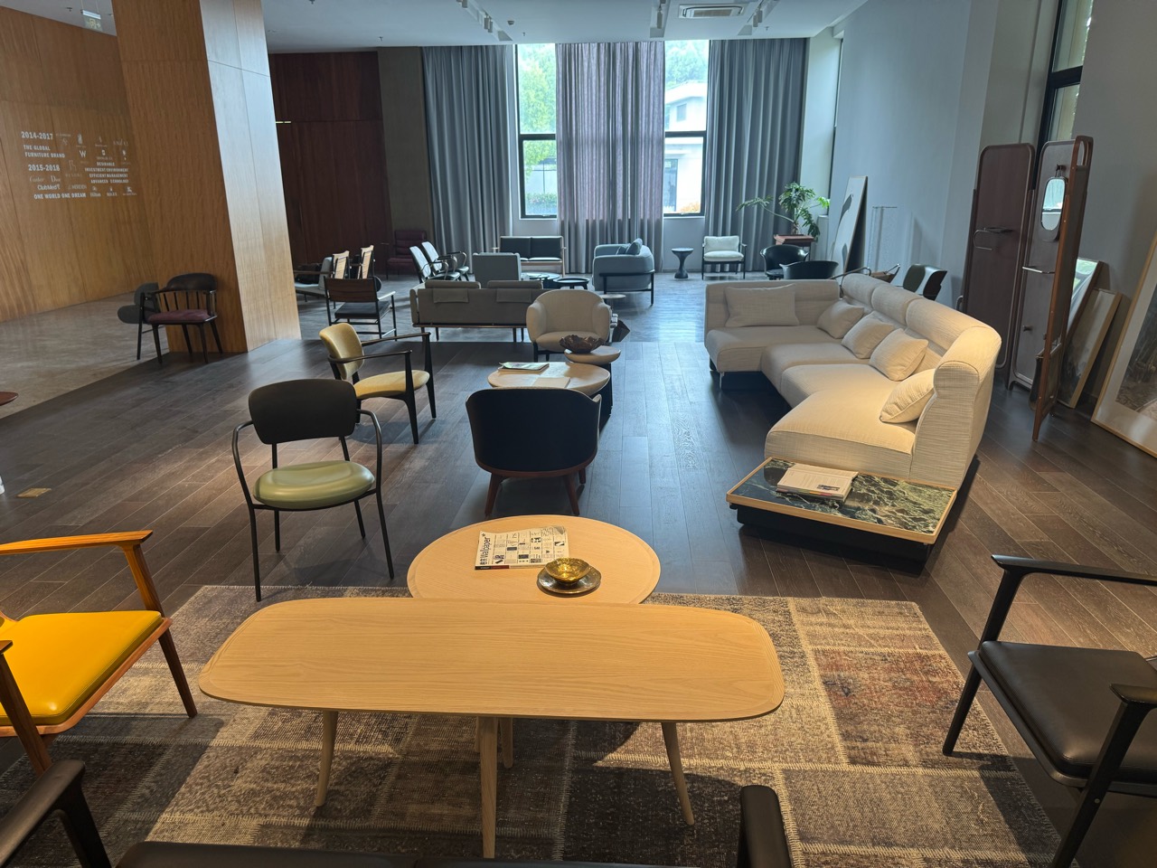 Sofas, chairs and tables arranged in one space